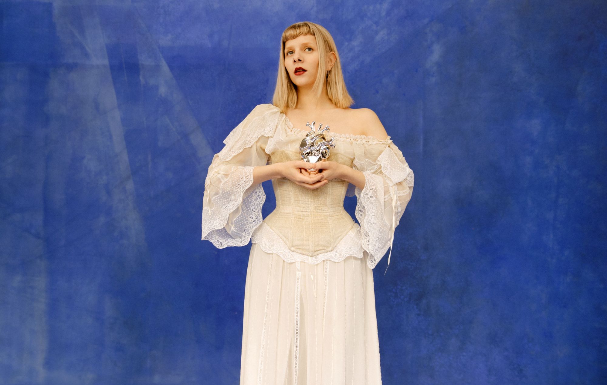AURORA announces new album ‘What Happened To The Heart’ and announces