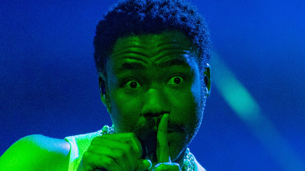 Donald Glover says his tour-ending health scare was stroke. Childish Gambino performs (main photo) during his New World Tour on August 17, 2024 in Detroit. (Getty)