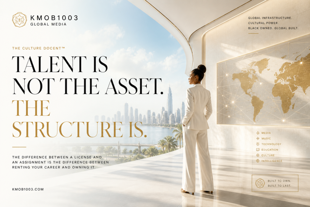 Black woman in a modern global office overlooking a city skyline, representing ownership, media infrastructure, and long-term value creation.